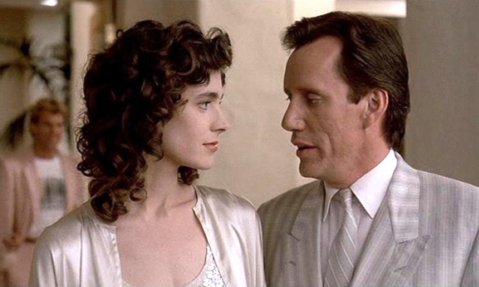 Sean Young and James Woods in The Boost